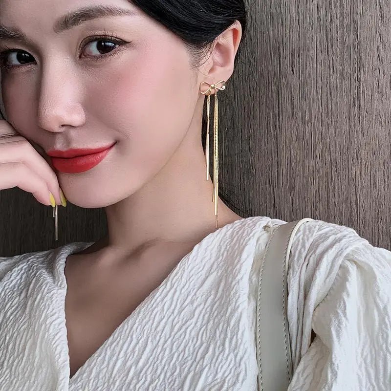 Classic Metal Bow Gold Tassel Drop Earrings - DROVA