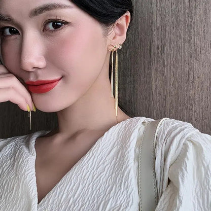 Classic Metal Bow Gold Tassel Drop Earrings - DROVA